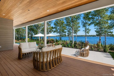 Newly completed and design-driven, this waterfront home makes a - photo 28