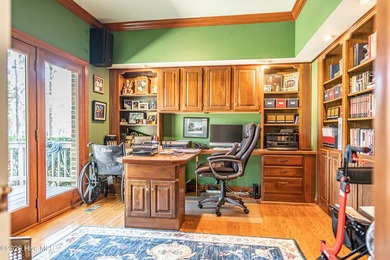 Located in the Pinehurst No. 6 neighborhood, this custom-built - photo 11