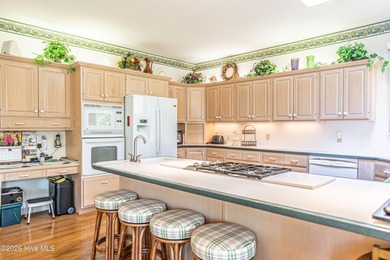 Located in the Pinehurst No. 6 neighborhood, this custom-built - photo 14