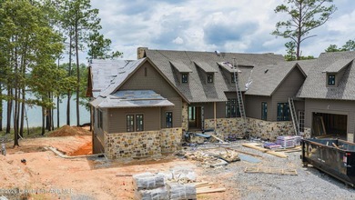 NEW CONSTRUCTION! This 6-bed, 5.5-bath custom Craftsman in The - photo 22