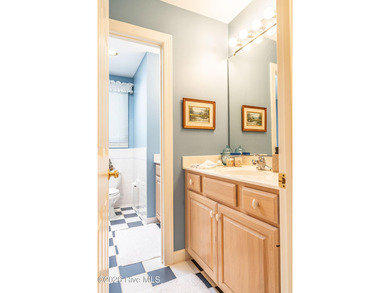 Located in the Pinehurst No. 6 neighborhood, this custom-built - photo 34