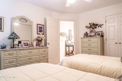 Located in the Pinehurst No. 6 neighborhood, this custom-built - photo 41