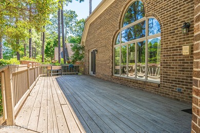 Located in the Pinehurst No. 6 neighborhood, this custom-built - photo 45