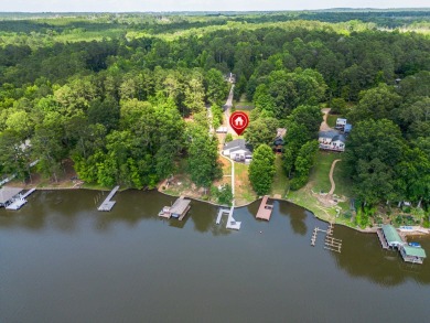 Welcome to your dream lakefront oasis! This stunning 3 bedroom/2 - Lake Home For Sale in Eatonton, Georgia