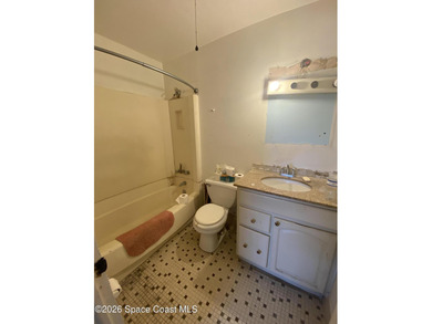 This 2nd floor unit is a handyman's delight. Tear out has been