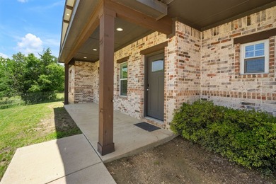 This 3-bedroom, 2-bath home offers an open floor plan situated - photo 3