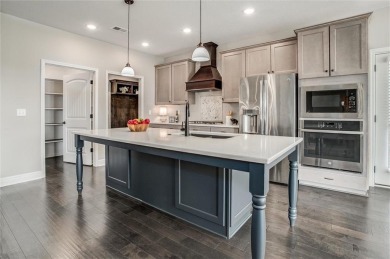 This home has two kitchens! From the moment you step inside