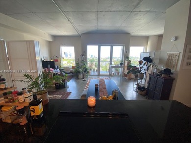 Live the ultimate Miami loft lifestyle in this expansive 2BR/2BA