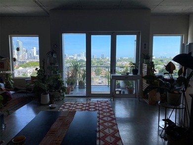 Live the ultimate Miami loft lifestyle in this expansive 2BR/2BA
