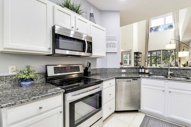 ENJOY GOLF VIEWS FROM THIS NICELY UPDATED TOWNHOUSE IN THE - photo 7