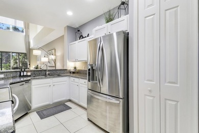ENJOY GOLF VIEWS FROM THIS NICELY UPDATED TOWNHOUSE IN THE - photo 9