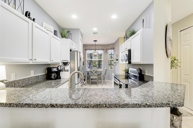 ENJOY GOLF VIEWS FROM THIS NICELY UPDATED TOWNHOUSE IN THE - photo 10