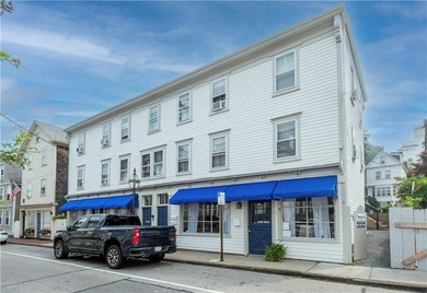130-132 Spring St is a classic historic Newport building in the - photo 3