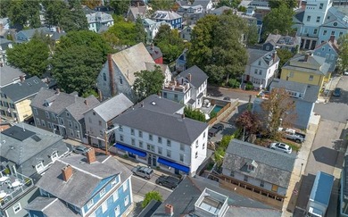 130-132 Spring St is a classic historic Newport building in the - photo 8