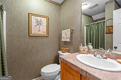 This stunning 4 bedroom, 4 bath home is packed is located in - photo 37