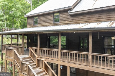 Tucked away on 5 private acres in the beautiful North Georgia - photo 1