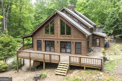 Tucked away on 5 private acres in the beautiful North Georgia - photo 2