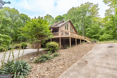 Tucked away on 5 private acres in the beautiful North Georgia - photo 4