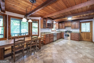 Tucked away on 5 private acres in the beautiful North Georgia - photo 9