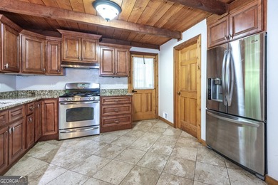 Tucked away on 5 private acres in the beautiful North Georgia - photo 10