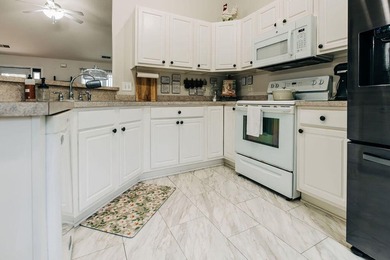 Welcome to this charming 3-bedroom, 2-bathroom home featuring a - photo 11