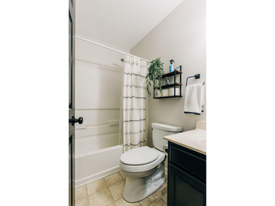 Welcome to this charming 3-bedroom, 2-bathroom home featuring a - photo 31