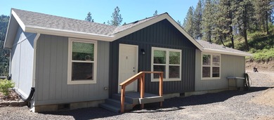 (private lake, pond, creek) Home Sale Pending in Ahsahka Idaho