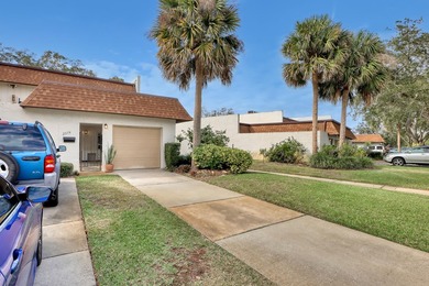 Step into this inviting two-bedroom, two-bathroom condo, where - photo 1