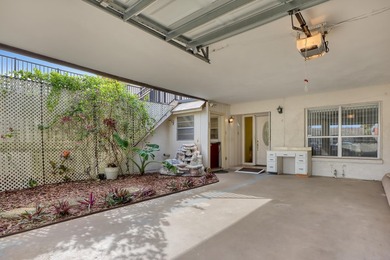 Step into this inviting two-bedroom, two-bathroom condo, where - photo 4