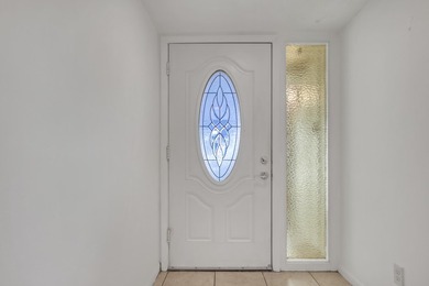 Step into this inviting two-bedroom, two-bathroom condo, where - photo 7