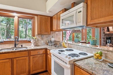 Nestled on three private lots overlooking Mountain Ranch Golf - photo 16