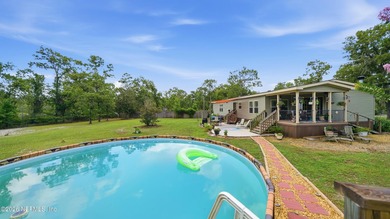 This well-maintained home offers generous living space - photo 50