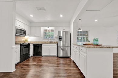 This one is a great find! FOUR bedroom, THREE bath home with - photo 9