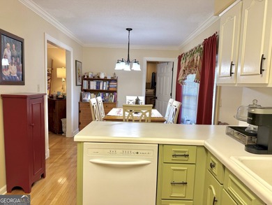 Charming, solid all-brick 2BR/1BA home tucked away on one of