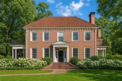 Located on Lullwater Road, the premier tree-lined street in - photo 1