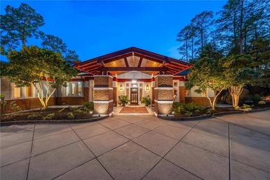 A brief drive from Fairhope, behind the gates of Steelwood, this - photo 2