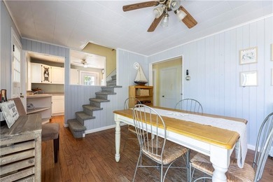 Nestled on desirable Harbour Island, this charming shingle-style - photo 14
