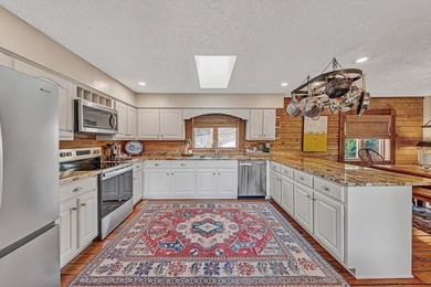 Lakefront property , 4 Bed 3 Bath log-style home in Lakeshore - photo 22