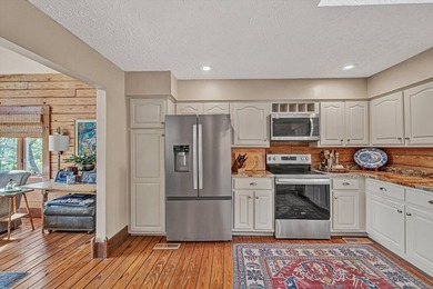 Lakefront property , 4 Bed 3 Bath log-style home in Lakeshore - photo 24