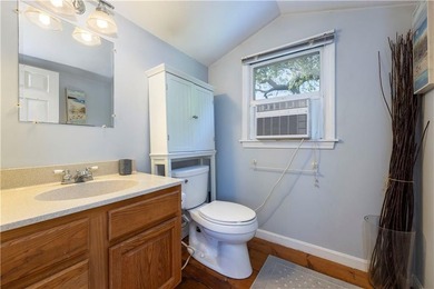 Nestled on desirable Harbour Island, this charming shingle-style - photo 27