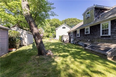 Nestled on desirable Harbour Island, this charming shingle-style - photo 30