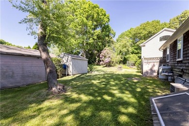 Nestled on desirable Harbour Island, this charming shingle-style - photo 31