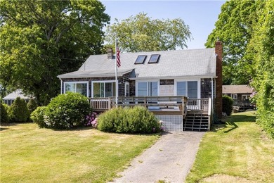 Nestled on desirable Harbour Island, this charming shingle-style - photo 32