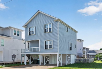 Welcome to your new beachside retreat--an inviting 4-bedroom, 4 - photo 3
