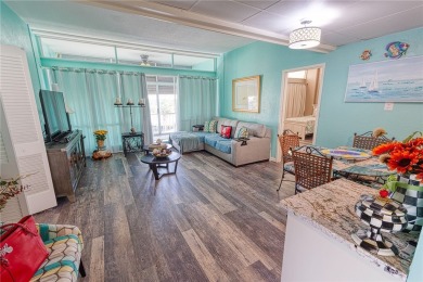 Very well-kept condo 2- bedroom 2 bath 2 cover parking garage on