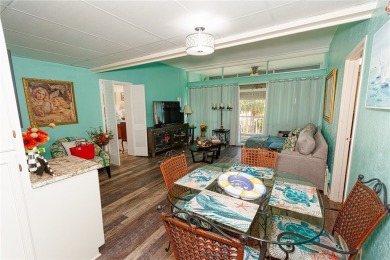 Very well-kept condo 2- bedroom 2 bath 2 cover parking garage on