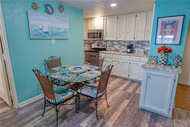 Very well-kept condo 2- bedroom 2 bath 2 cover parking garage on