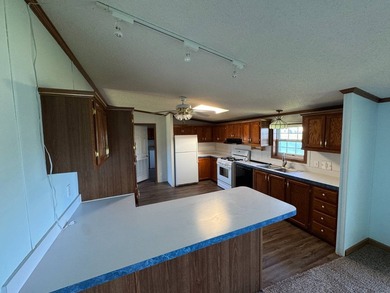 Located in the Edgewood Estates mobile home community - $69,900 - photo 7