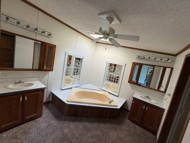 Located in the Edgewood Estates mobile home community - $69,900 - photo 10