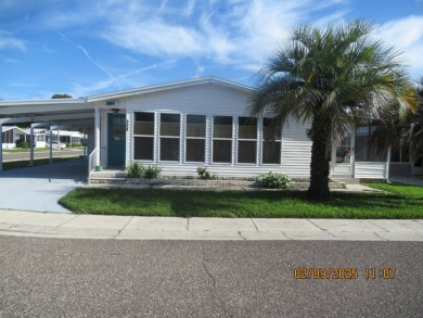 Lake Home For Sale in Zephyrhills, Florida